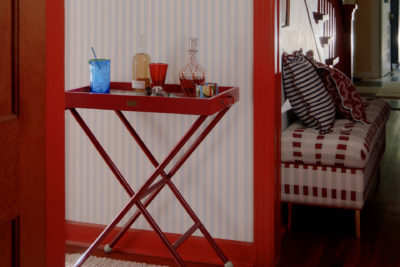 Matilda Goad and Anthropologie Collaboration of a red bar trolley