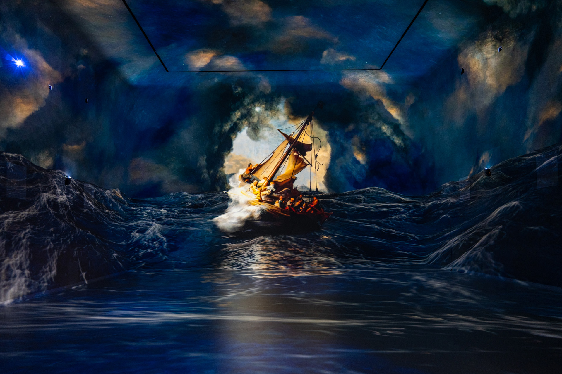A boat in the sea at an immersive exhibition