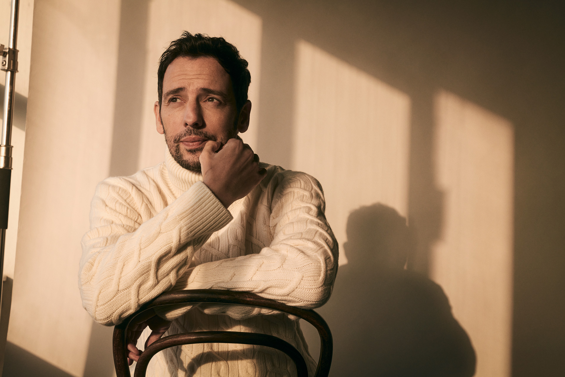 Ralf Little on a chair