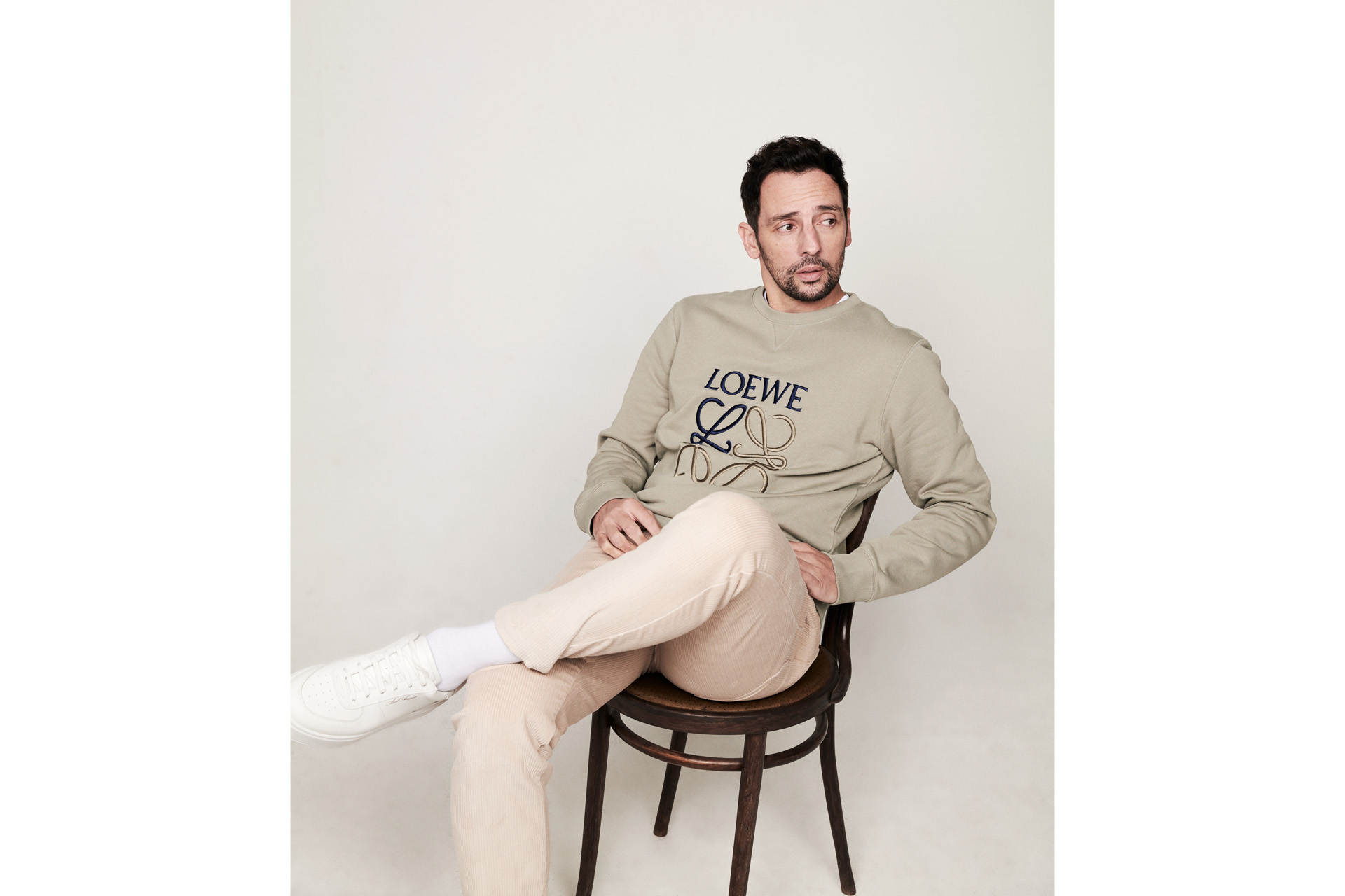 Ralf Little photographed on a chair