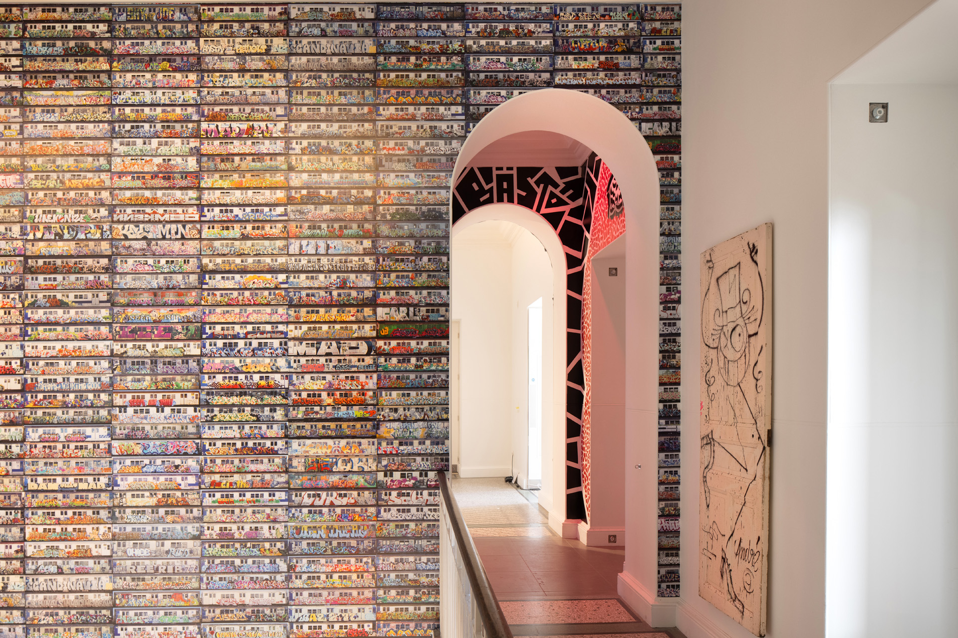 An archway surrounded by art