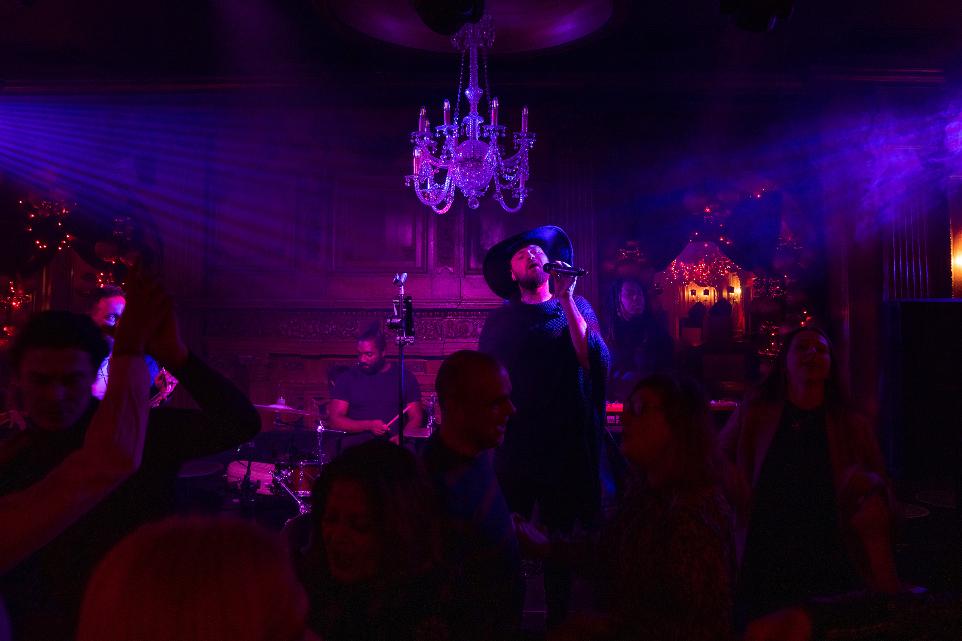 Guest enjoy live music at Tramp, private members club on 22 December 2022