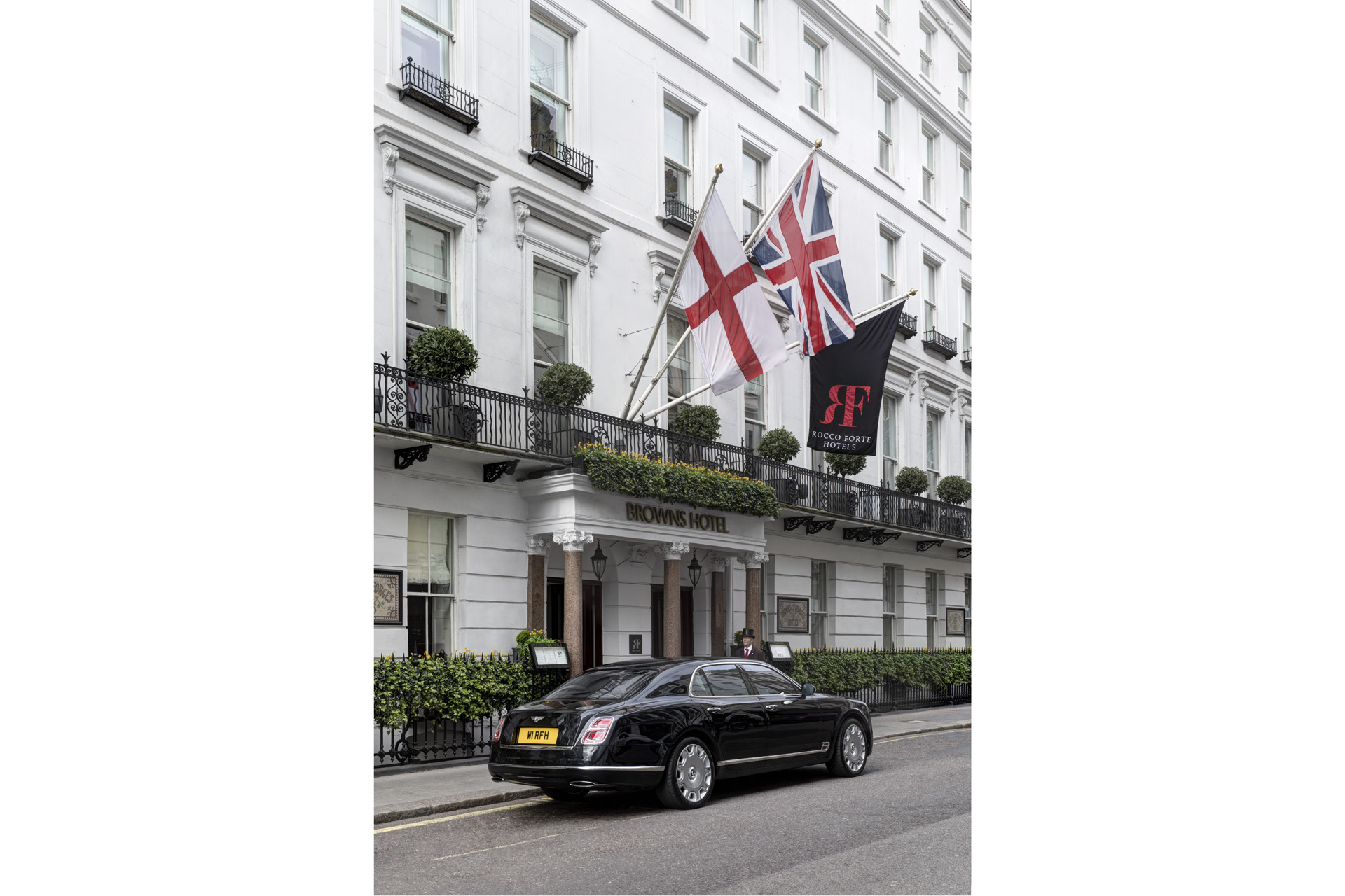 The facade of Brown's Hotel with a black car outside