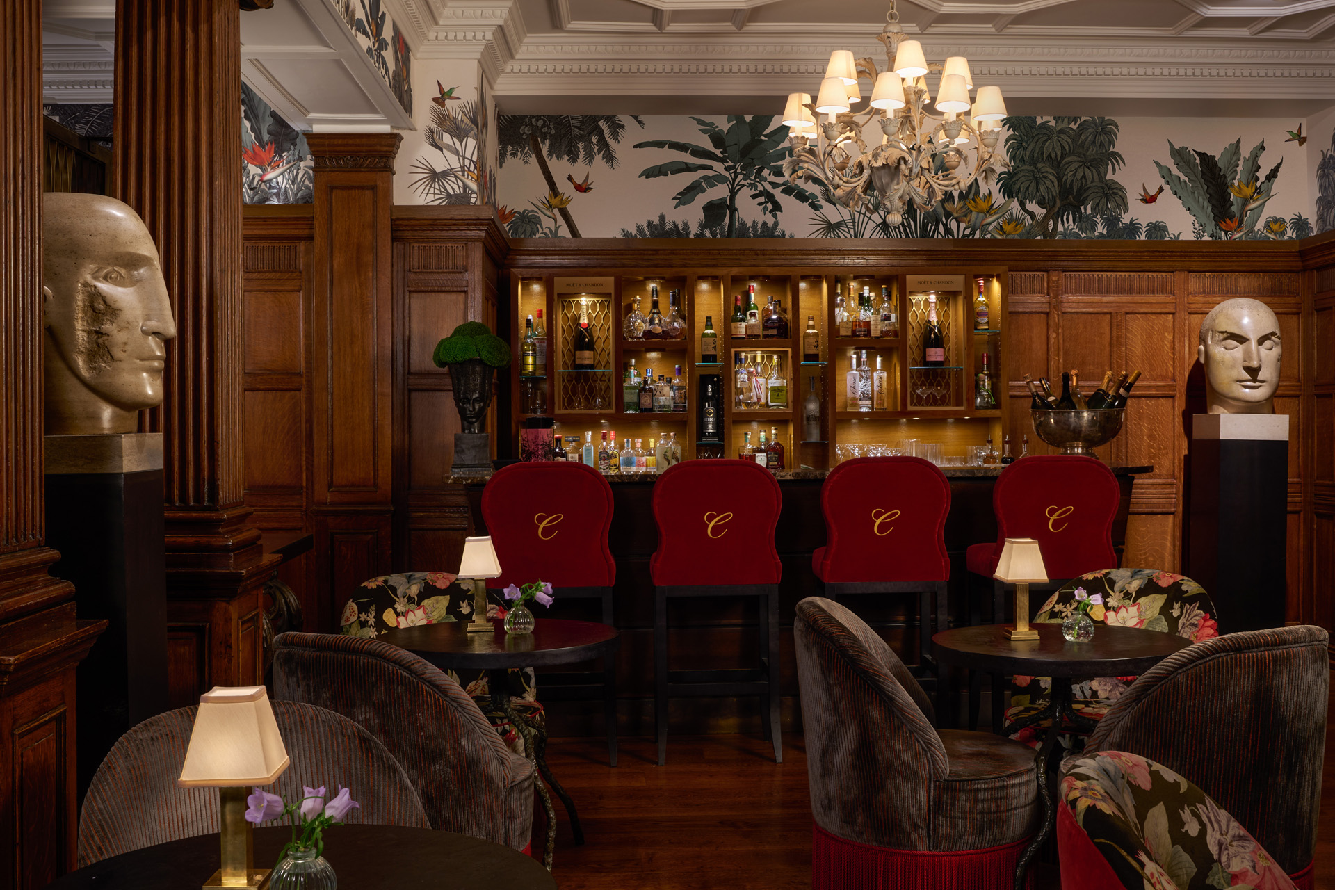 The wood-clad bar at Charlie's with velvet bar stools