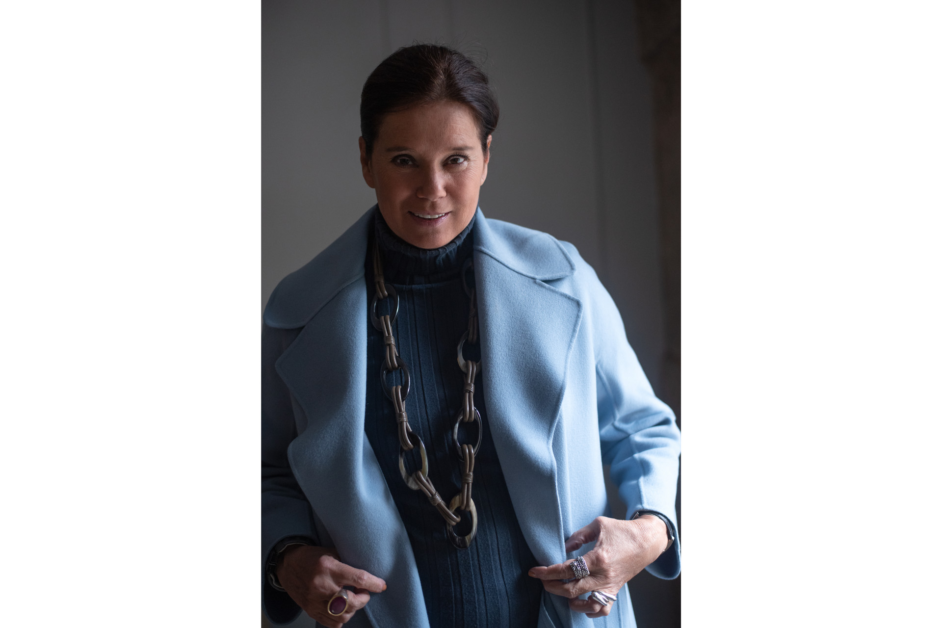 A portrait of Tissa Fontaneda in a blue coat