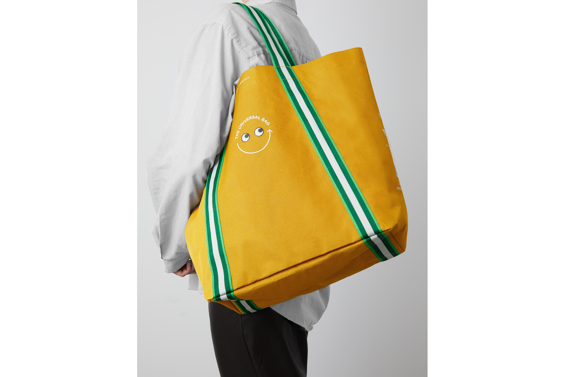 Woman holding orange bag