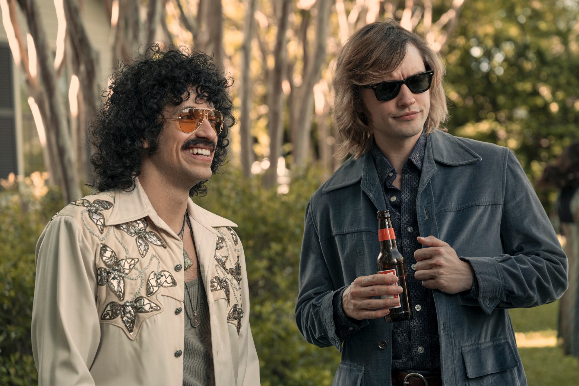 Sebastian Chacon as Warren Rojas and Josh Whitehouse Eddie Roundtree in Daisy Jones & The Six