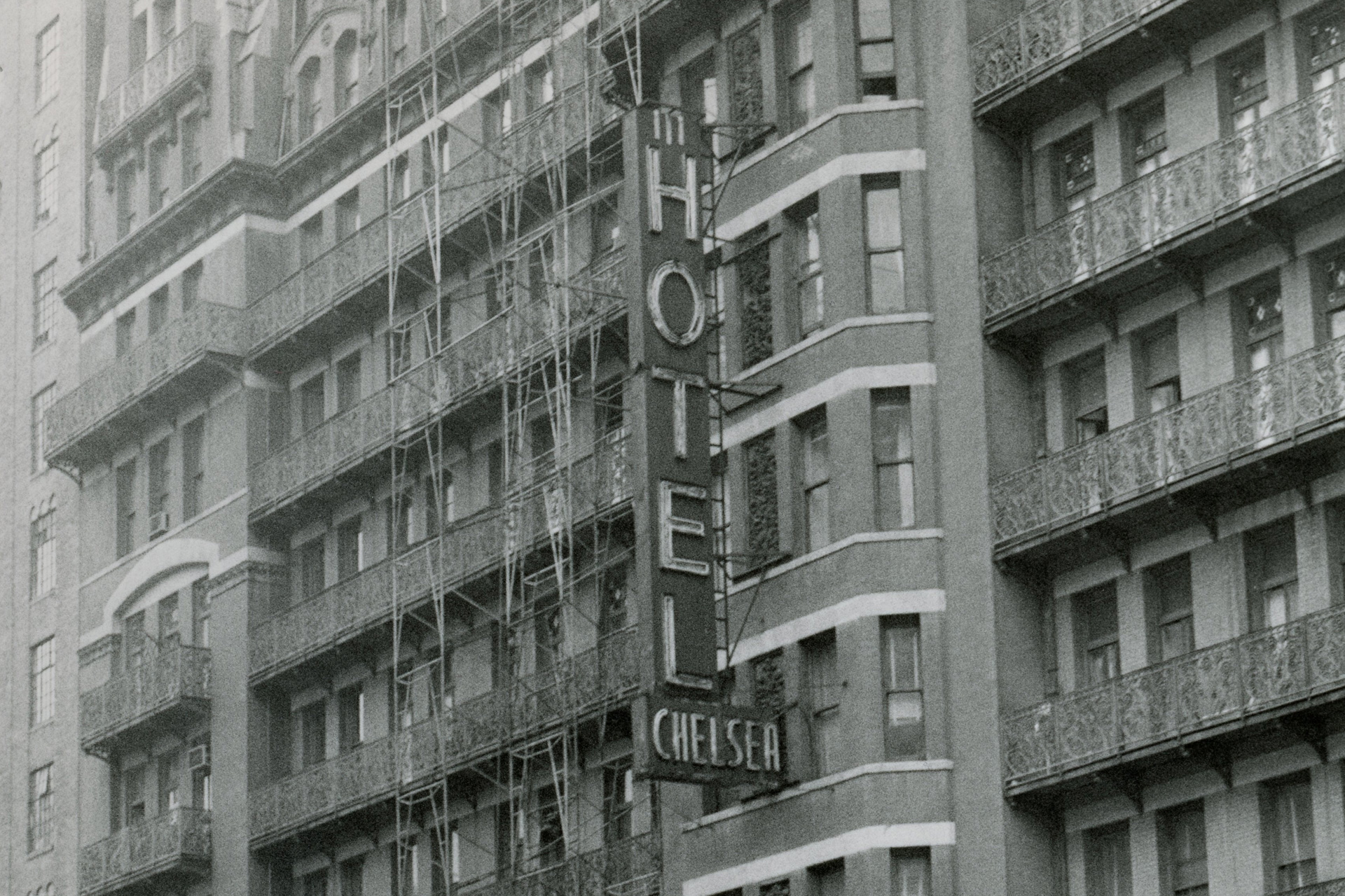 Black and white photo of Hotel Chelsea sign, NYC