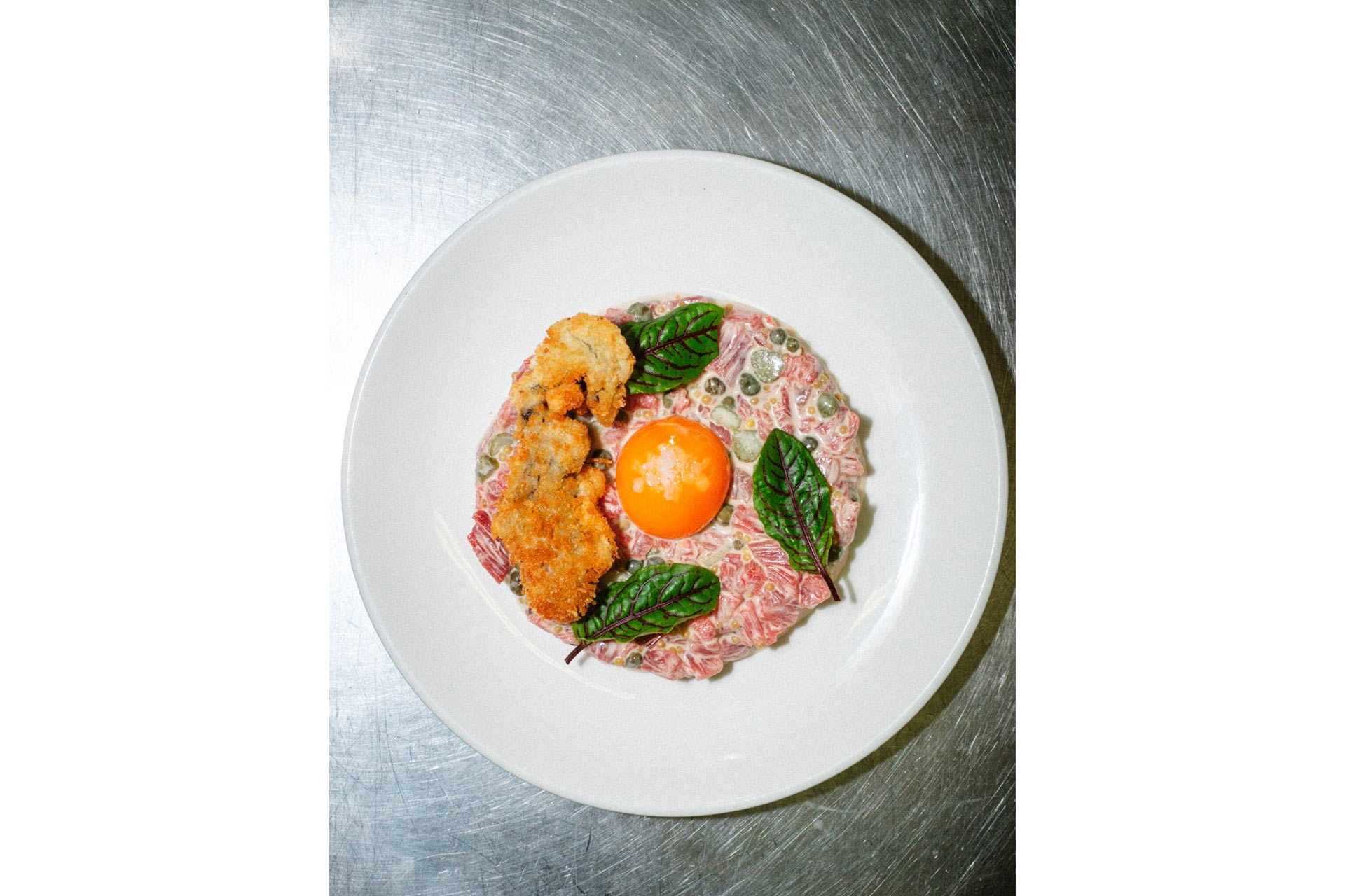 Beef tartare with oyster cured yolk