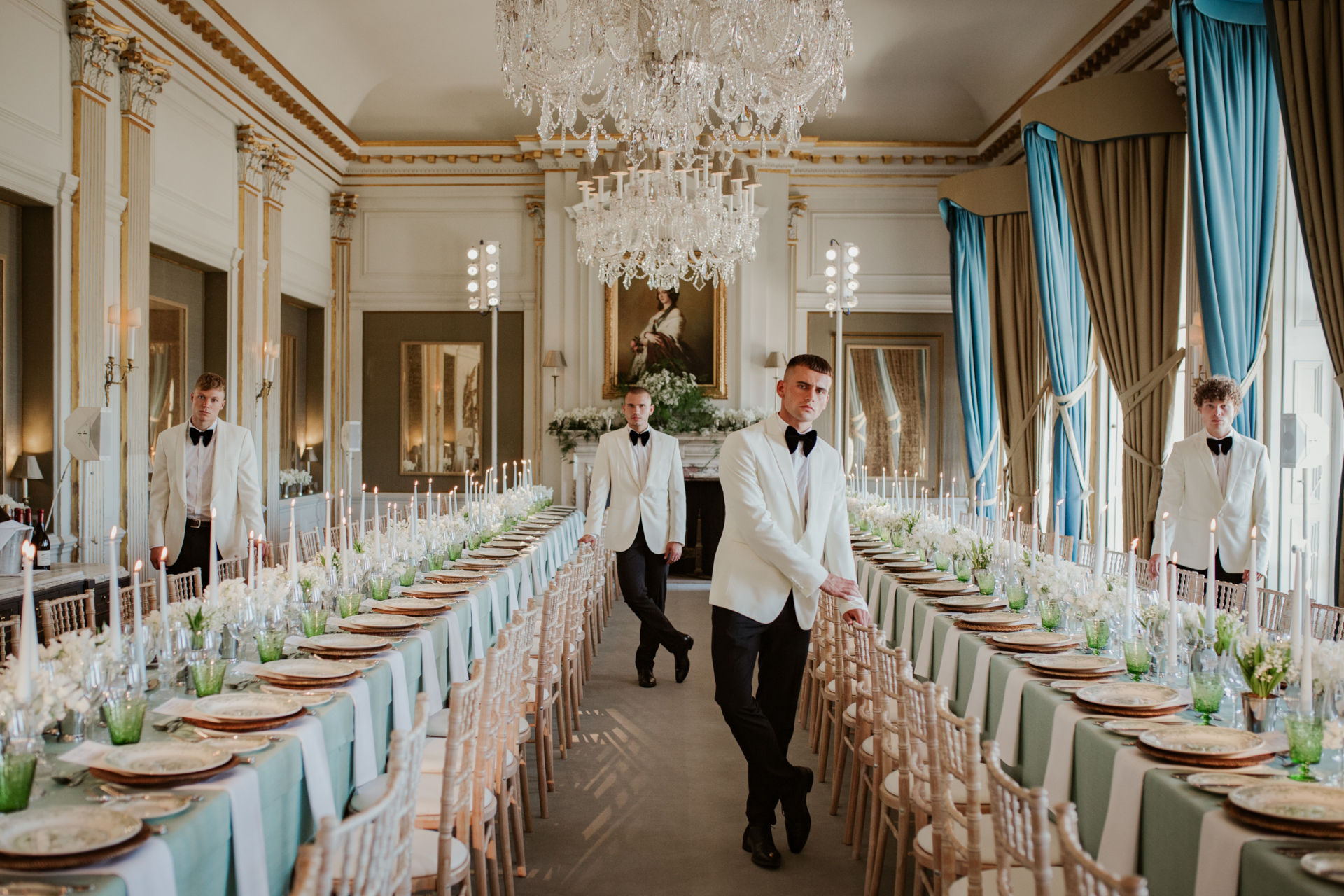 Mean in suits in dining room