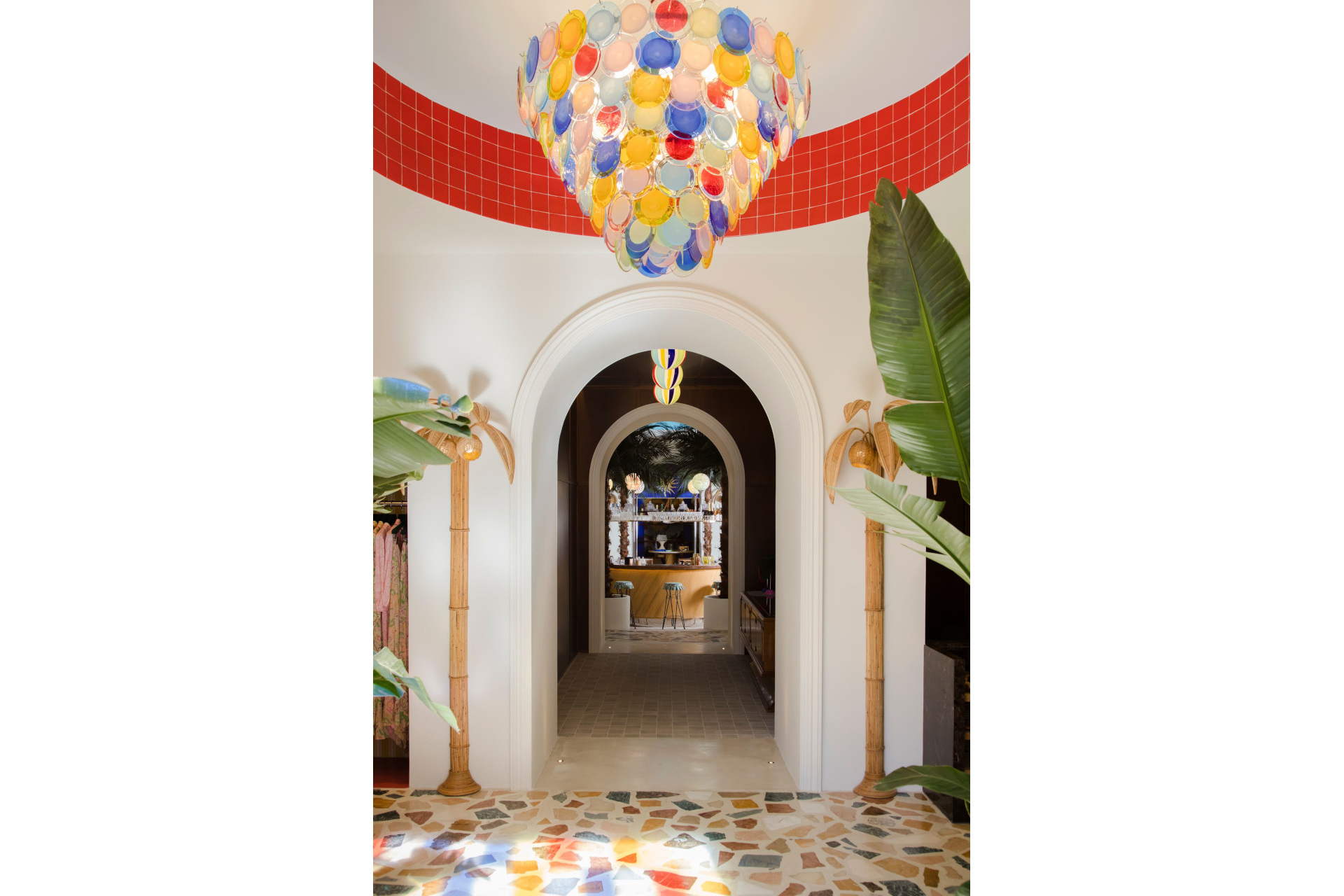 What arches with plants and colourful lights and floors