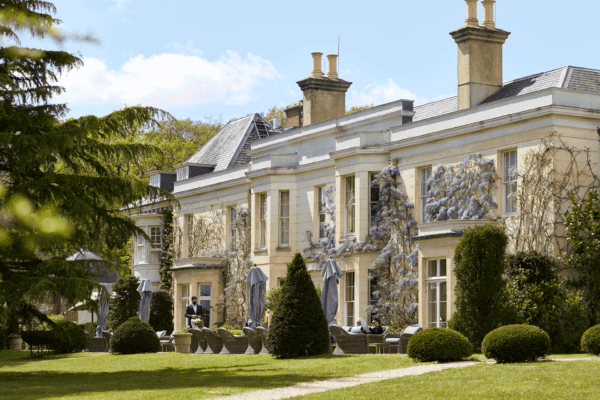 Wisteria-clad exterior of Lime Wood Hotel