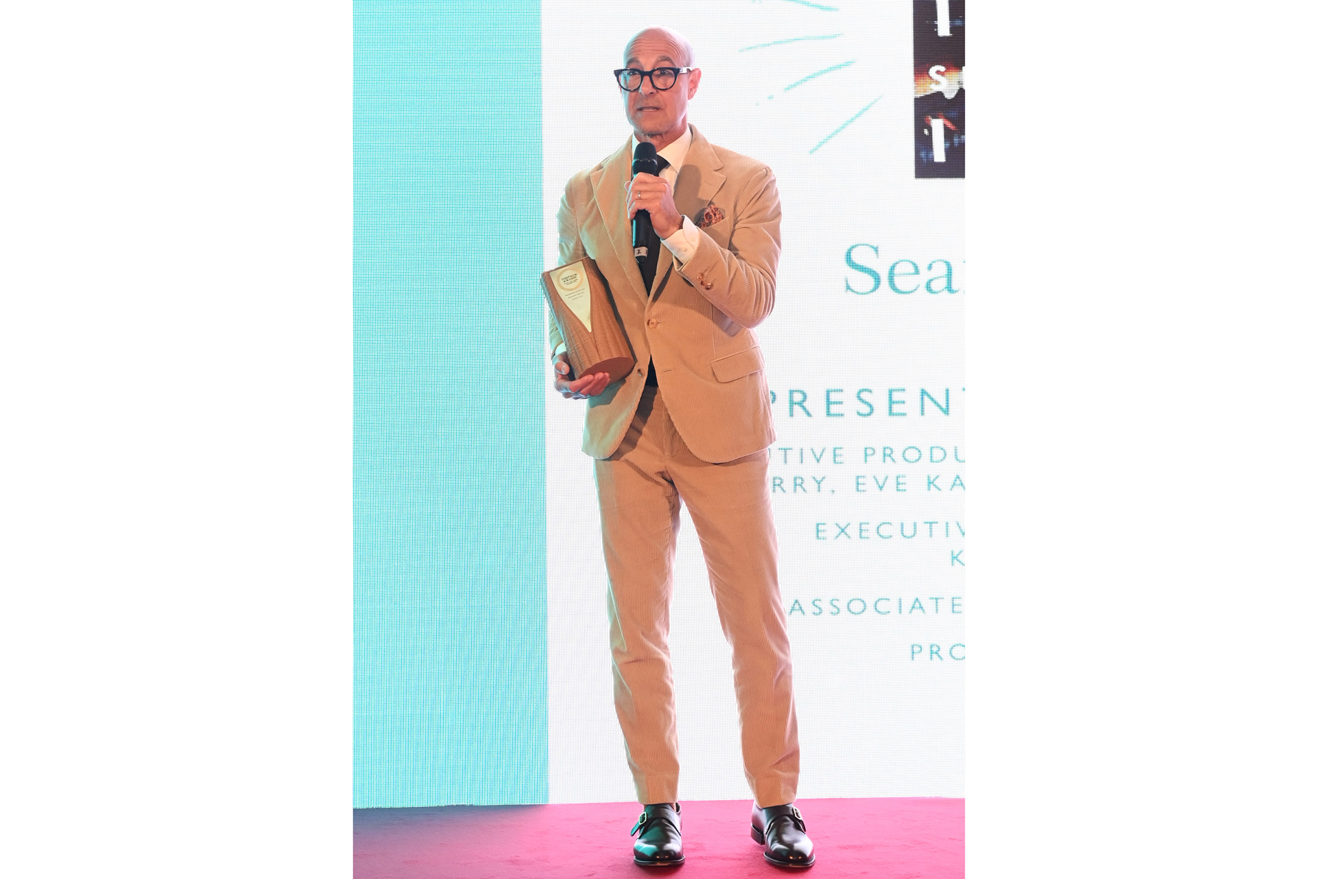 Stanley Tucci winning an award at the Fortnum & Mason food and drink awards