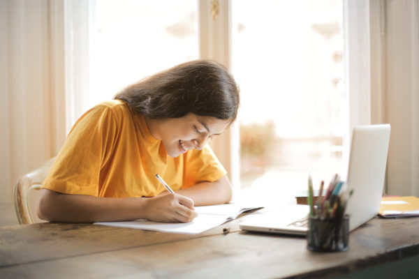 Pupil studying at home