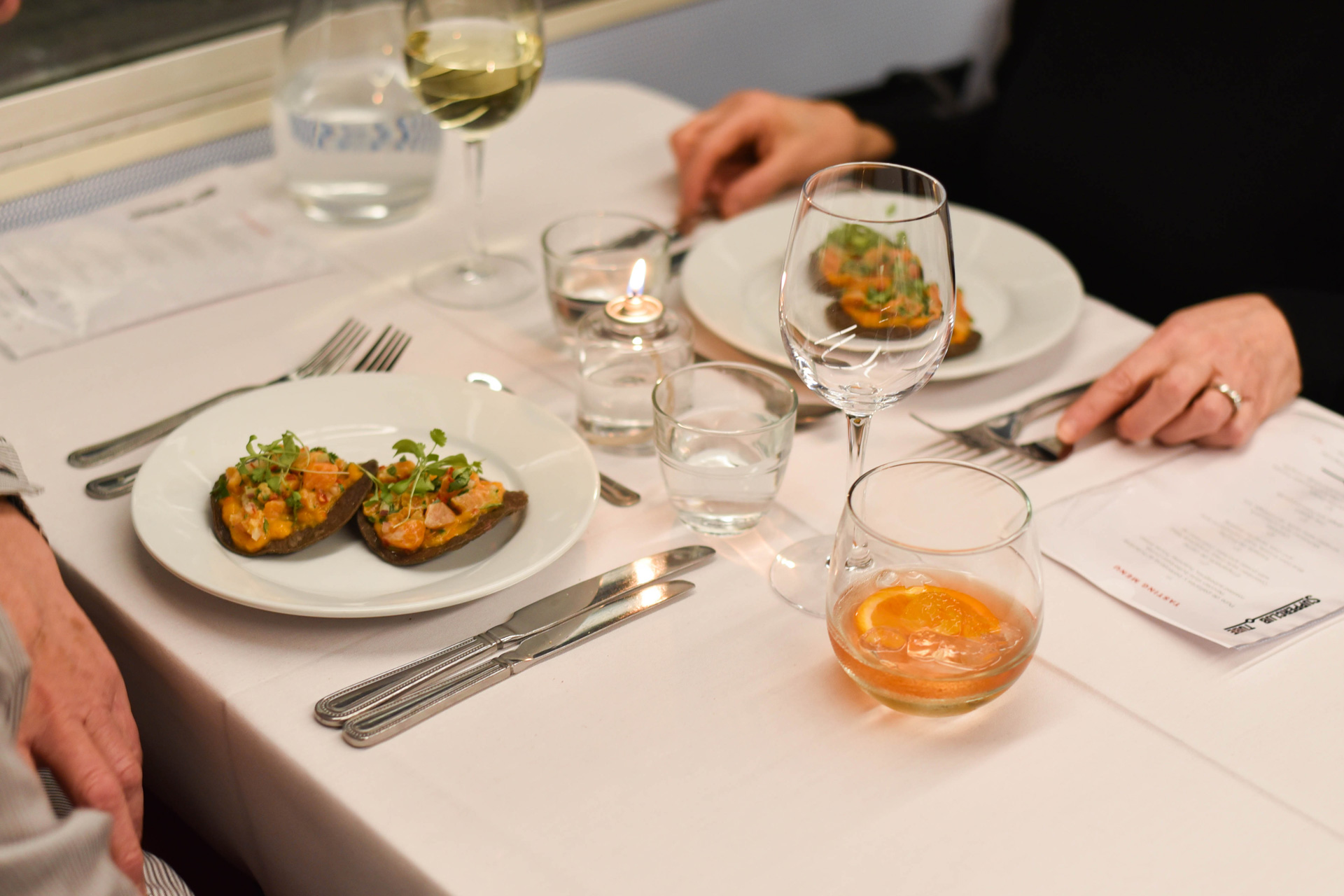 Food at Supperclub. tube, a pop-up dining experience on a tube carriage