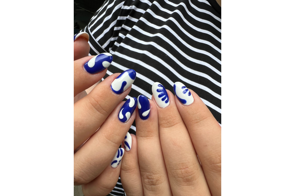 Close up of blue and white nails