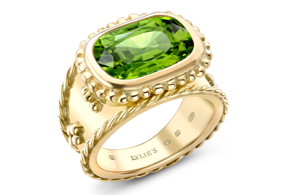 Gold ring with green stone