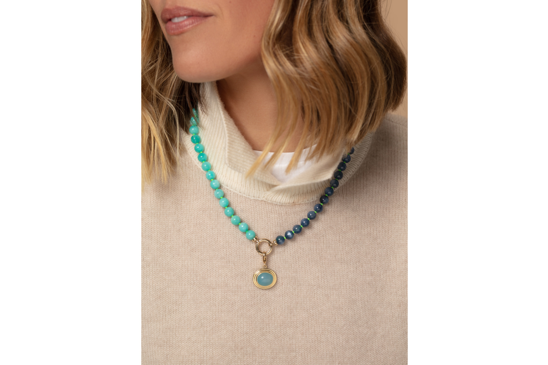 Woman wearing beaded necklace