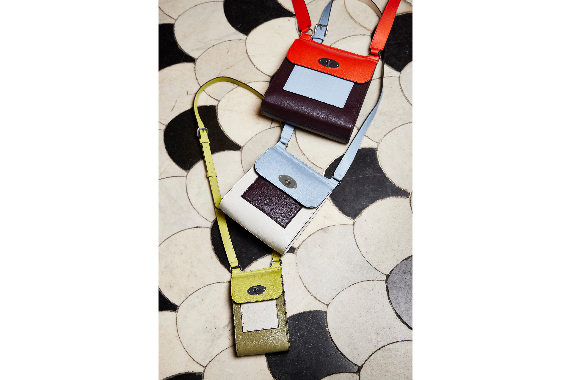 Bags lined up on tile floor