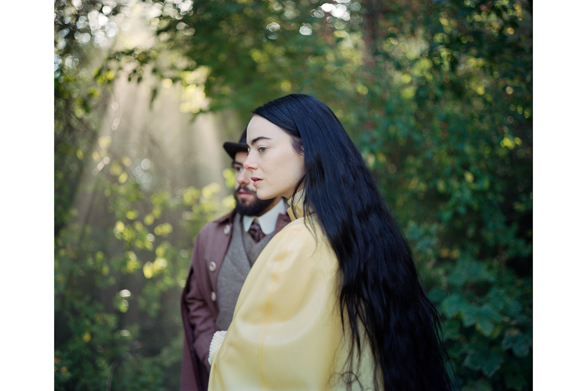 Ramy Youssef and Emma Stone in POOR THINGS