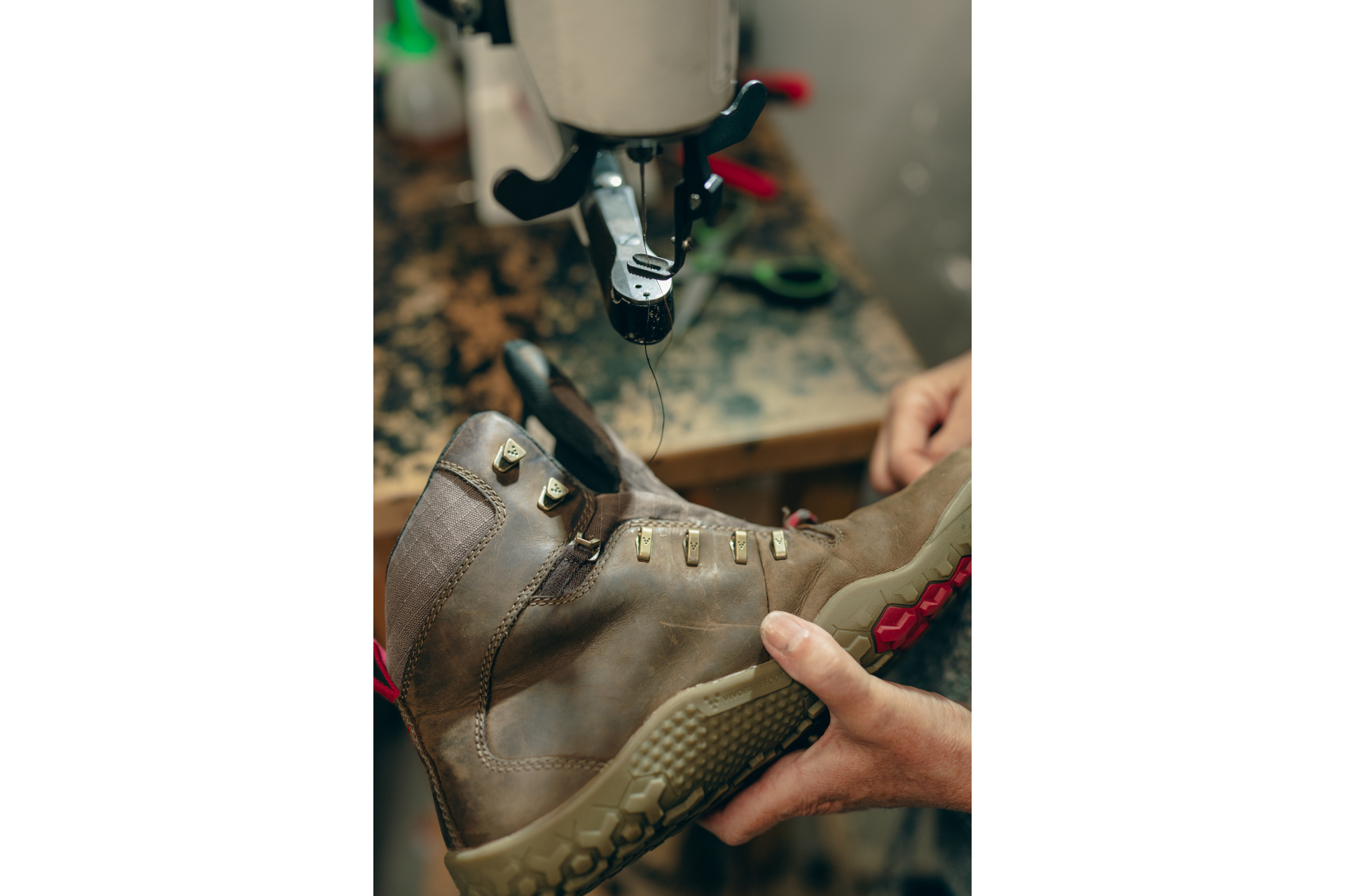 Close up of shoe being sewn