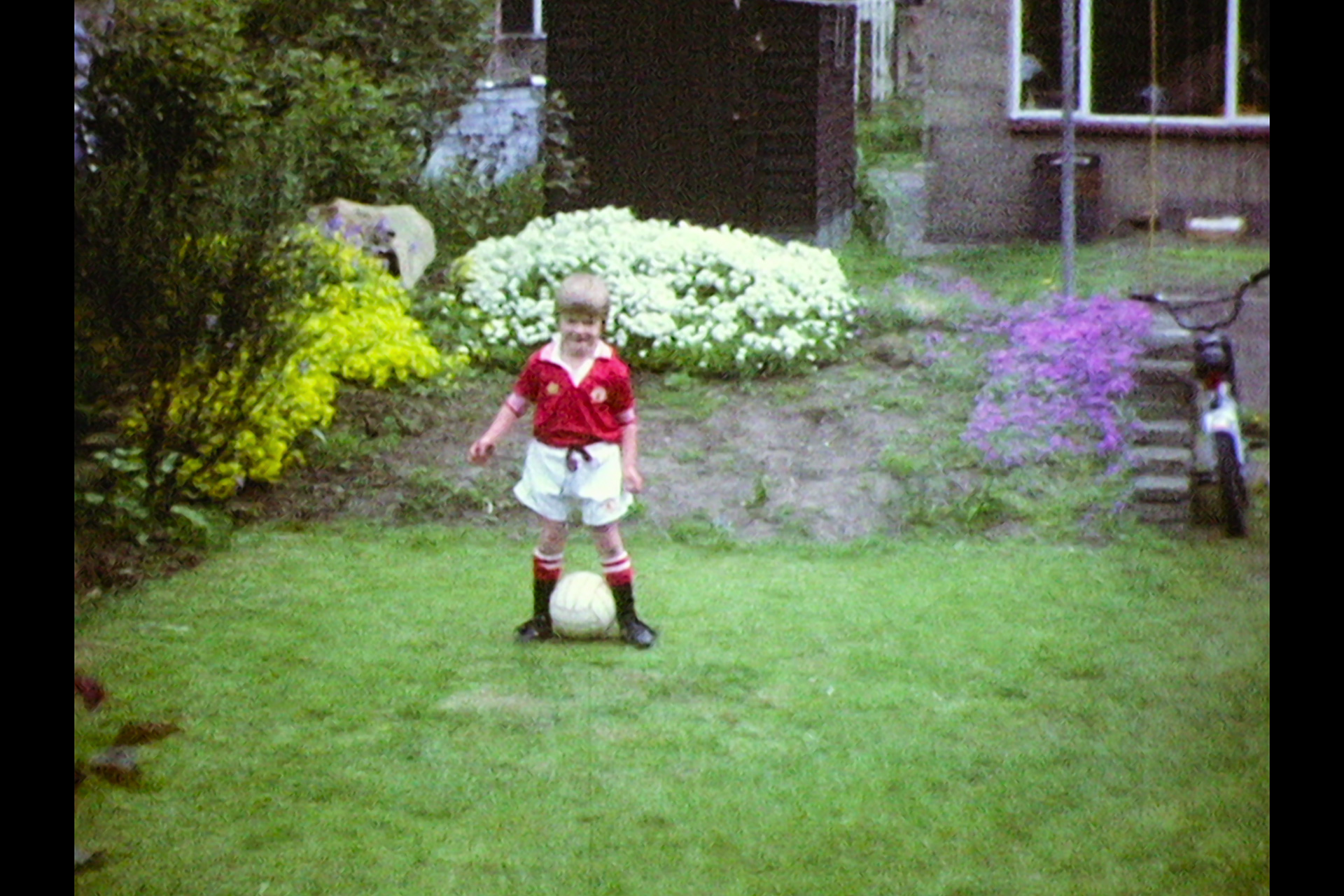 David Beckham as a young boy playing football